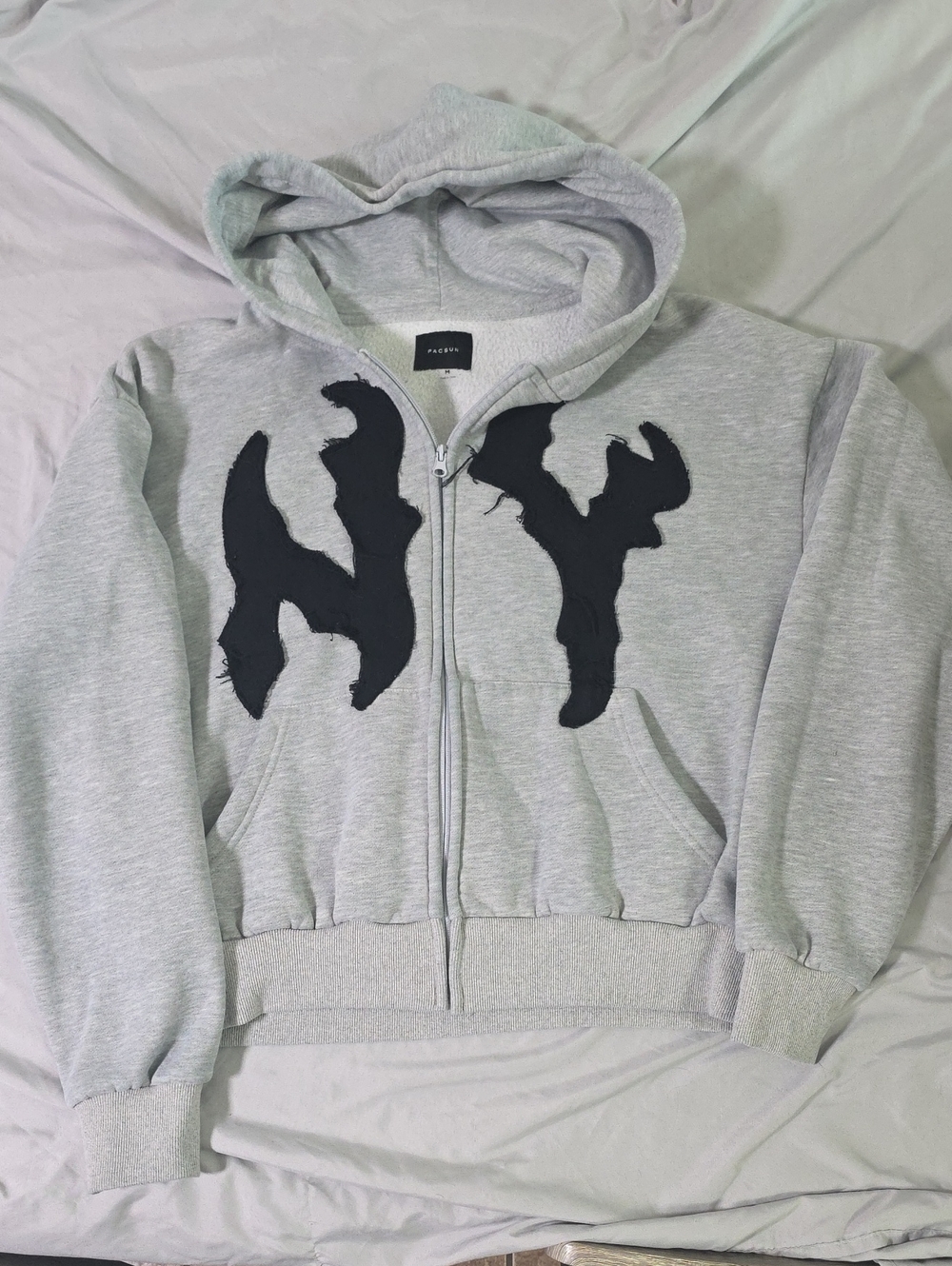 PacSun Light Gray Zip-Up Hoodie with Black Appliqué